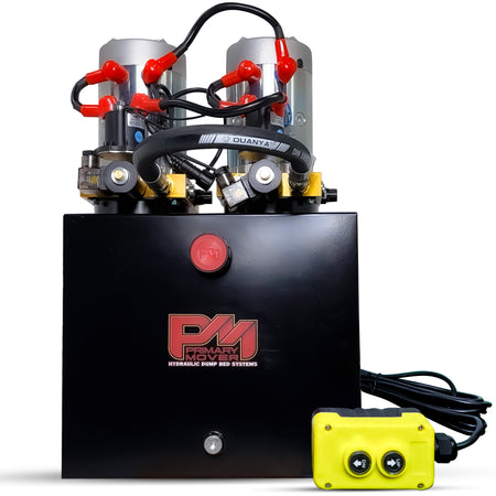 Primary Mover 24V Twin Engine Single-Acting Hydraulic Power Unit with visible red and black buttons, wires, and a yellow switch. Suitable for telescopic dump applications.