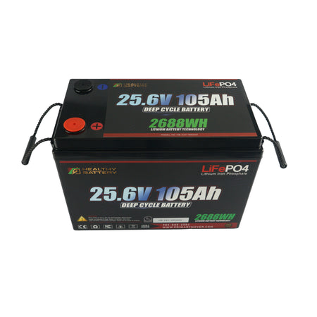 **Title:** Healthy Battery 25.6V 105Ah LiFePO4 Deep Cycle Battery

**Alt Text:** Rectangular LiFePO4 battery labeled 25.6V 105Ah with handles, red and black terminals, branded Healthy Battery.

**Meta Description:** Discover the Healthy Battery 25.6V 105Ah LiFePO4, a high-output deep cycle battery with Bluetooth monitoring and integrated BMS for optimized hydraulic systems.